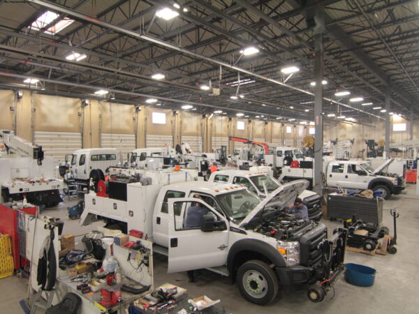 Holman workshop with trucks inside